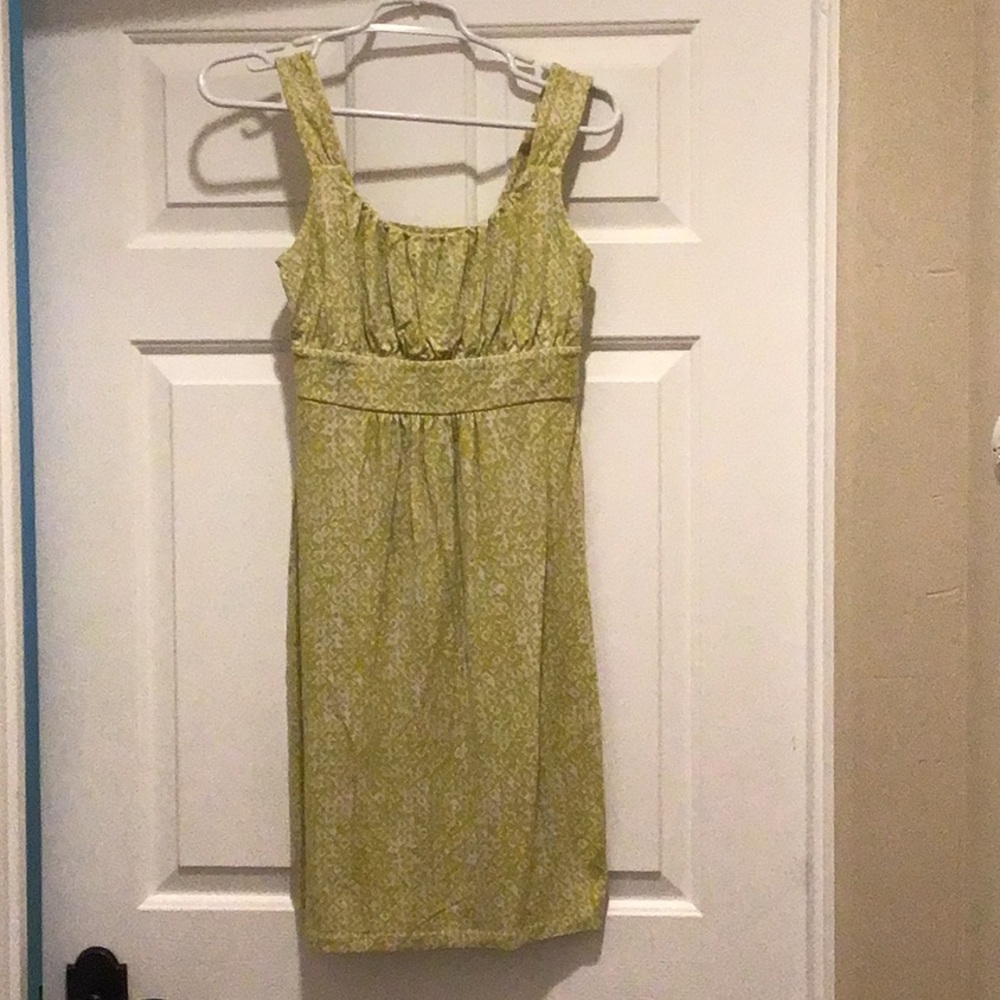 Ann Taylor sun dress in a yellowish green color with cream.
